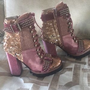 Never worn Jeffrey Campbell boots.